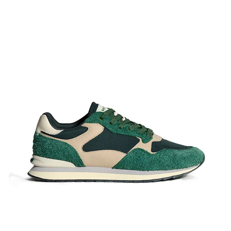 Men's green suede sneakers with beige panels and dark logo accents