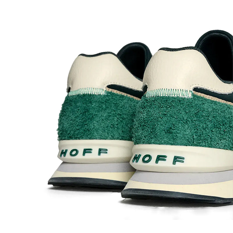 Men's sneakers heel view with green suede, black lining, and 'HOFF' branding