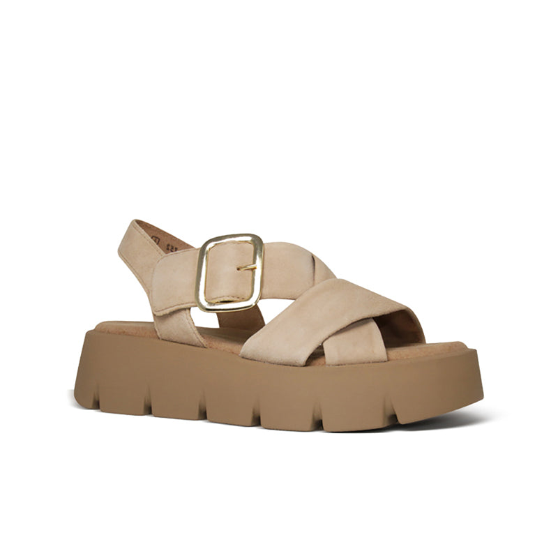 Tan leather platform sandals with wide straps and square metal buckle