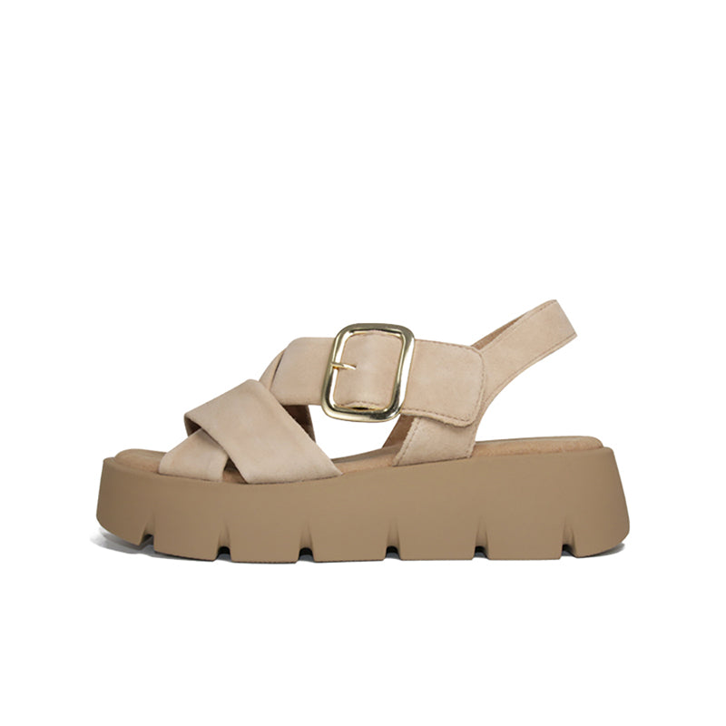 Tan leather platform sandals with square metal buckle and crossed straps
