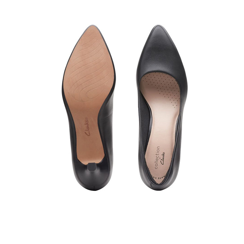 Women's black leather pointed-toe heels with perforated insole detail