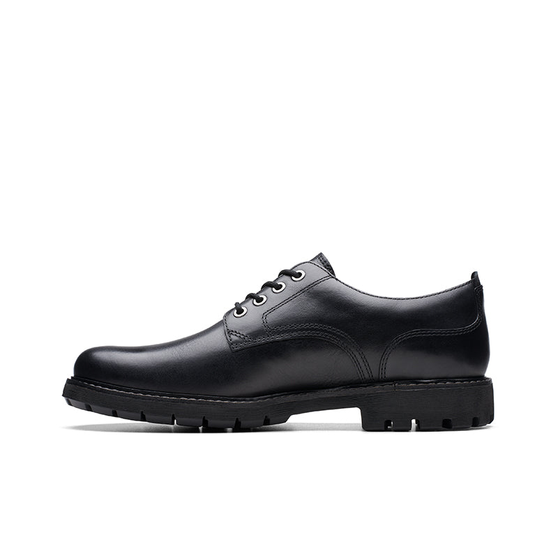 Men's black leather lace-up oxford shoe with stitched panels and tread sole