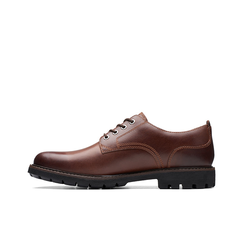 Men's dark brown leather lace-up oxford shoe with side panels and tread sole