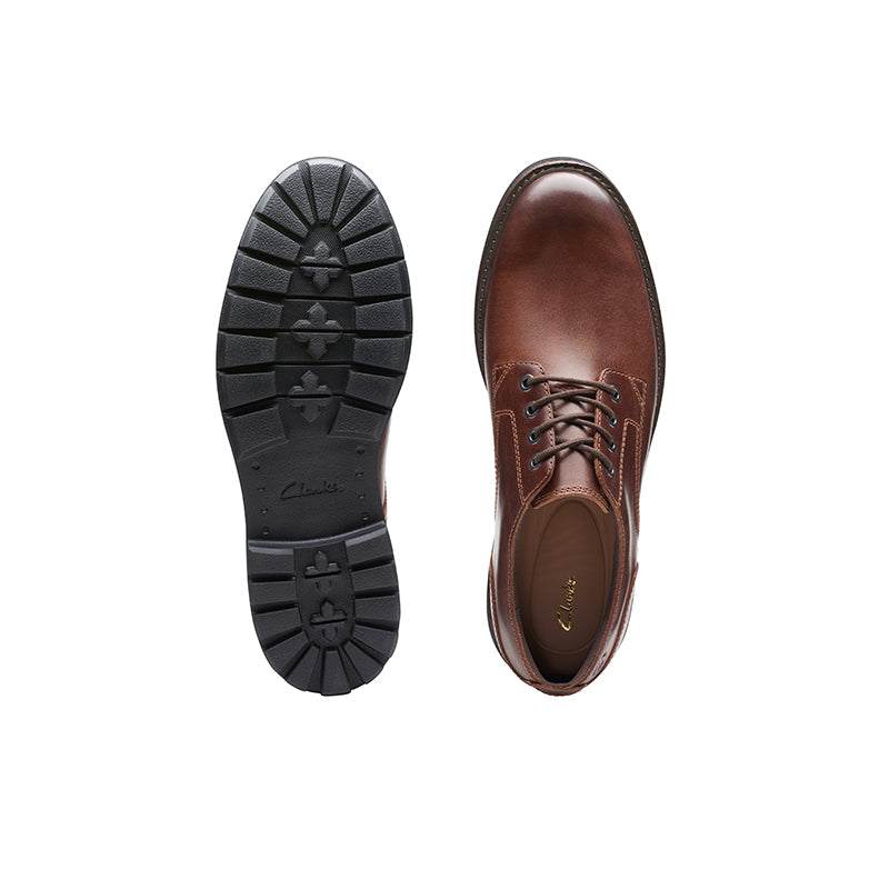 Men's dark brown leather shoe sole and lace-up upper side view