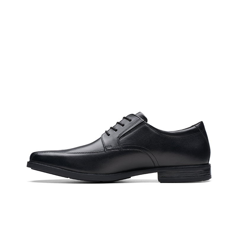 Black leather oxford shoes for men with lace-up front and rounded toe
