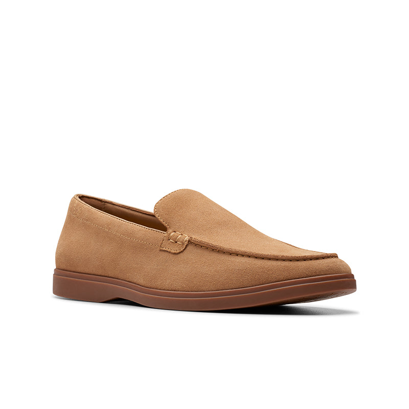 Suede slip-on loafers with moc seam detail, brown/tan upper and low brown outsole.