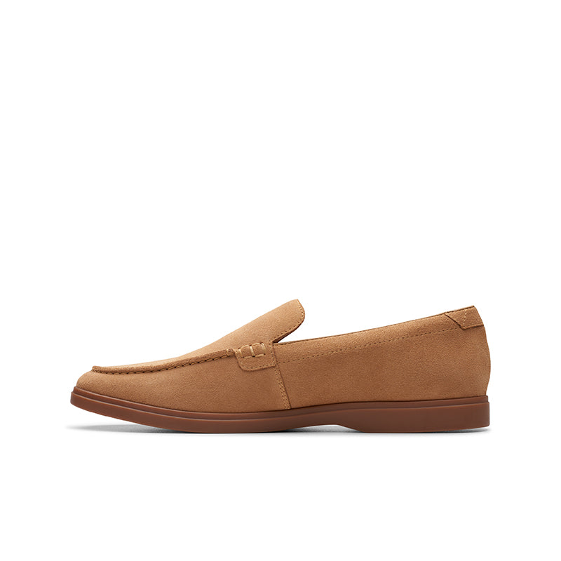 Suede slip-on loafers, brown/tan with moc seam, low brown outsole (side view).