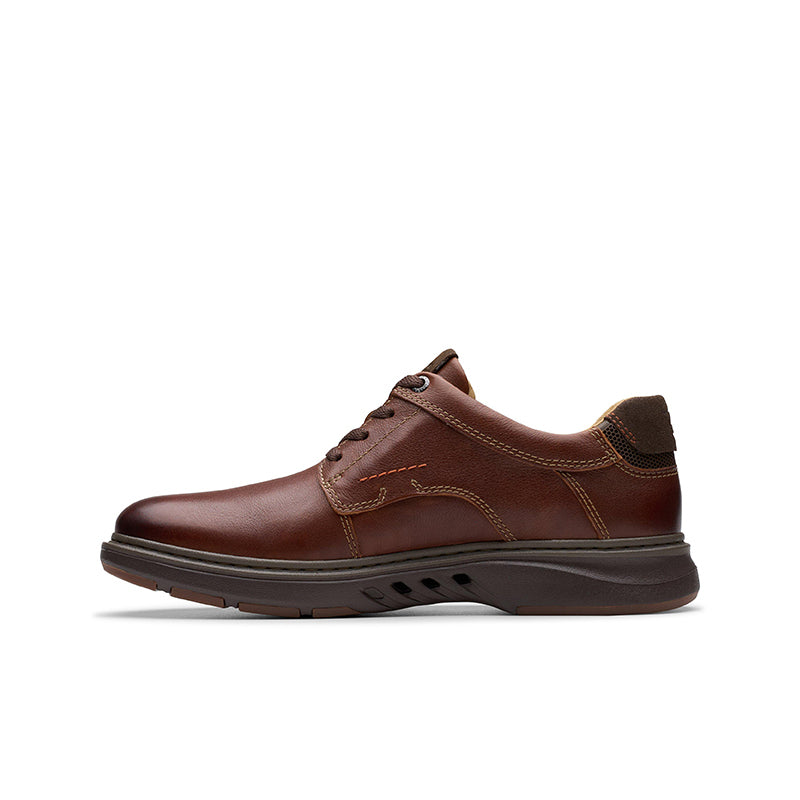Men's brown leather lace-up business shoe side profile with lace-up vamp