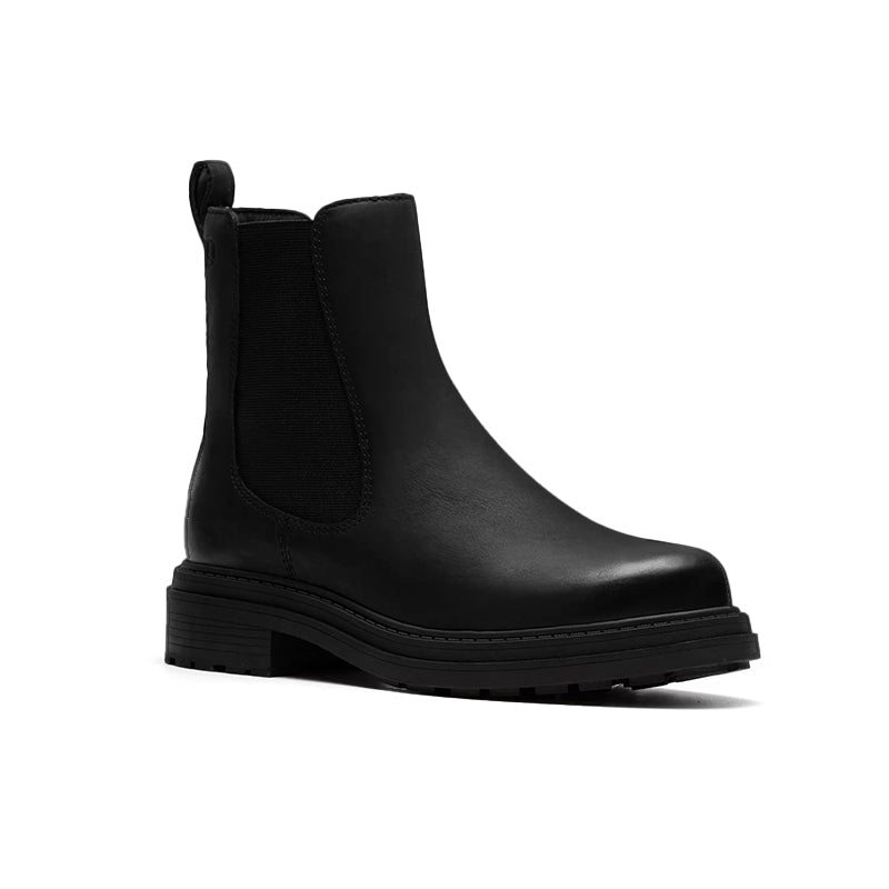 Black leather slip-on ankle boots with side elastic panels and rugged sole