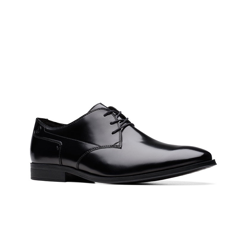 Black lace-up leather business shoe with cap toe and low sole