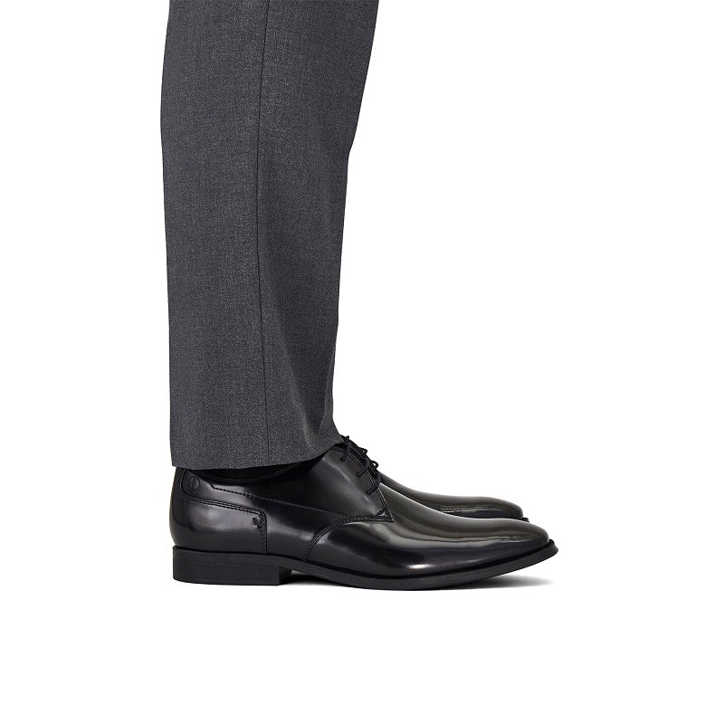 Black leather dress shoe with lace-up front and low stacked heel, side view