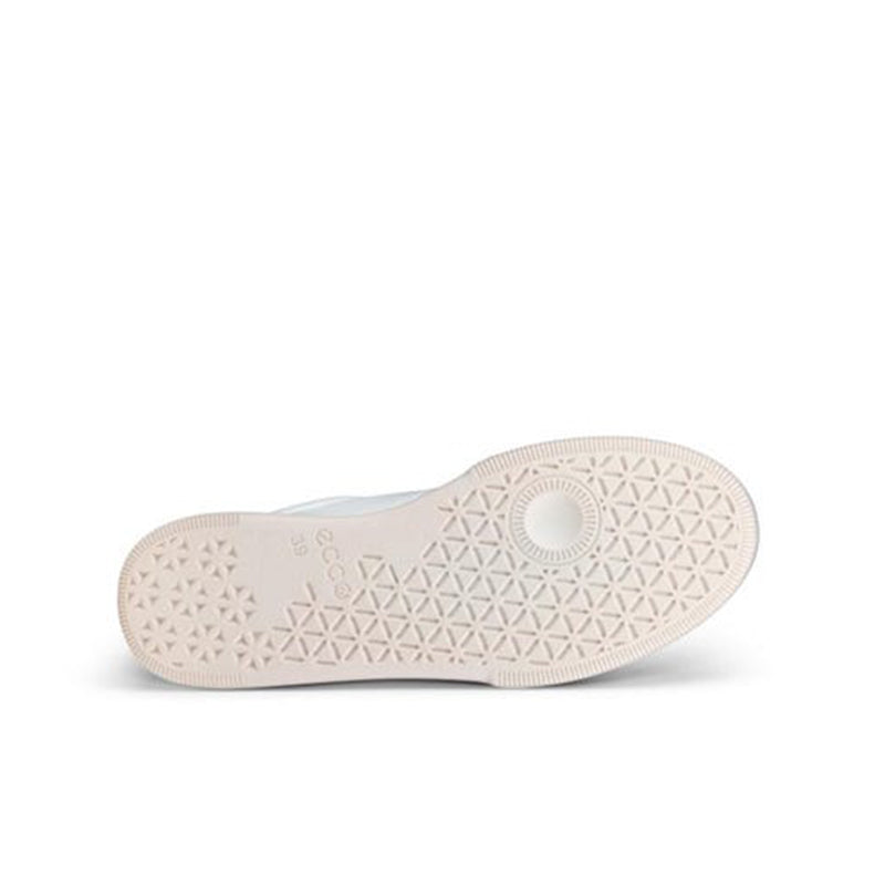 Shoe outsole with textured traction pattern and circular tread detail