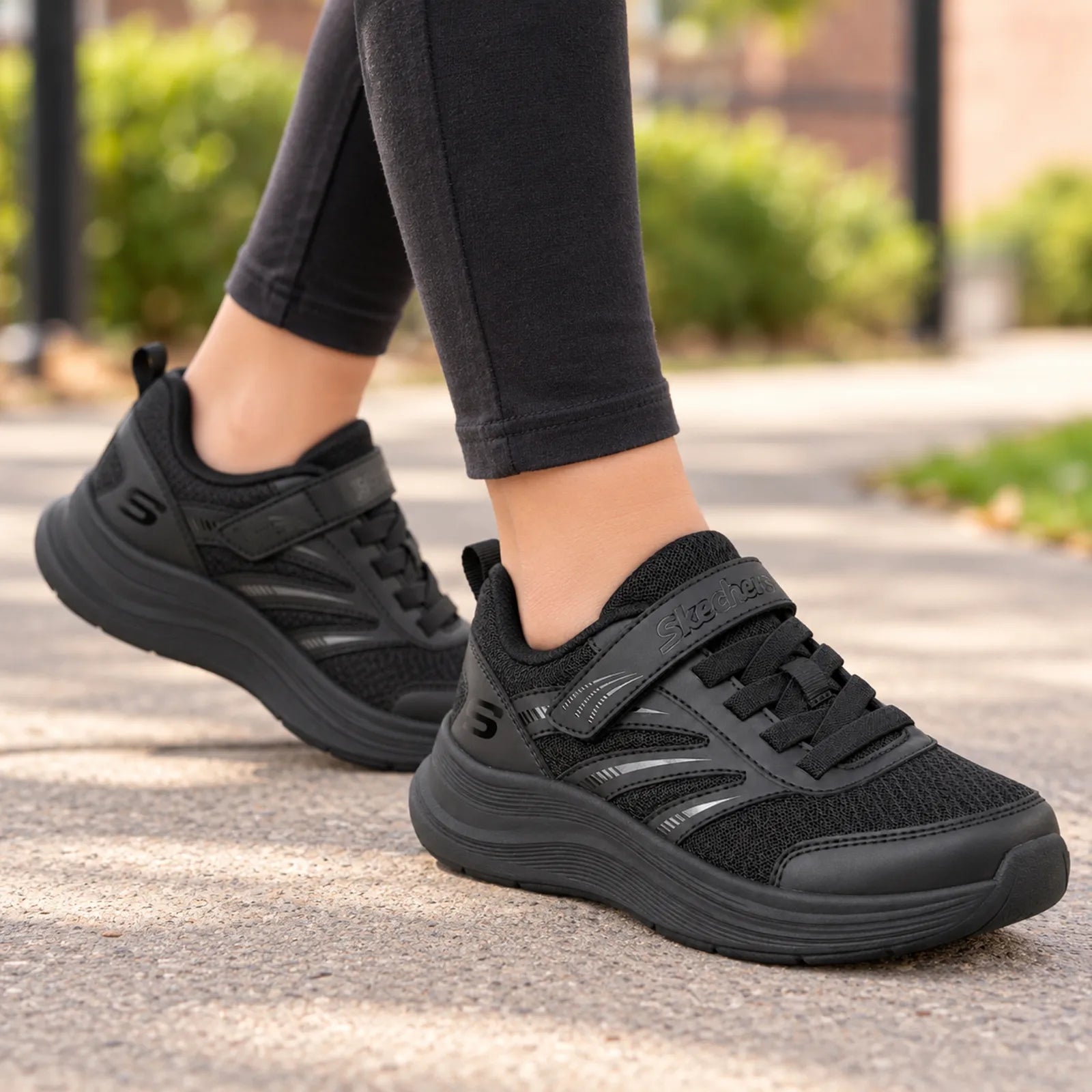 Skechers kids girls black trainers for school and everyday wear