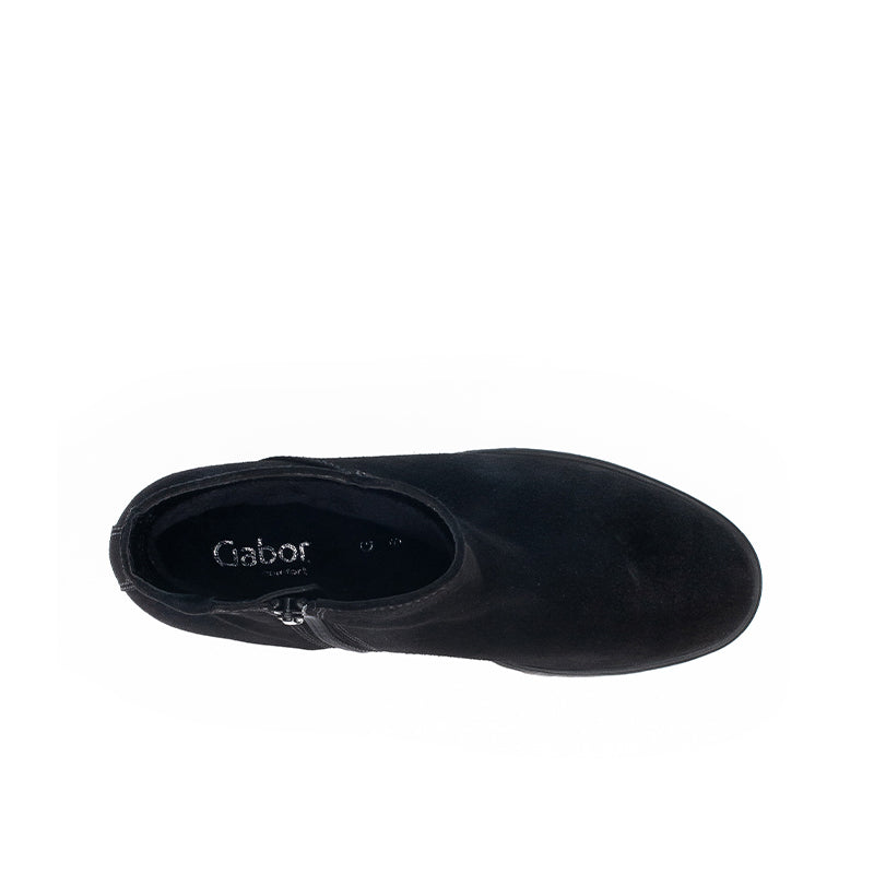 Black suede Chelsea boots with cushioned lining and rounded toe