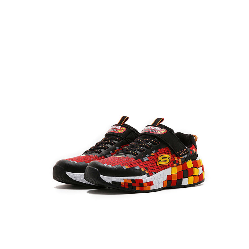 Boys' black and red low-top sneakers with pixel-style paneling and thick white sole