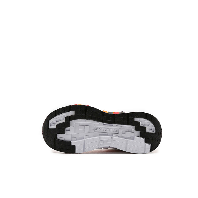 Boys' sneaker outsole view with black tread and white midsole