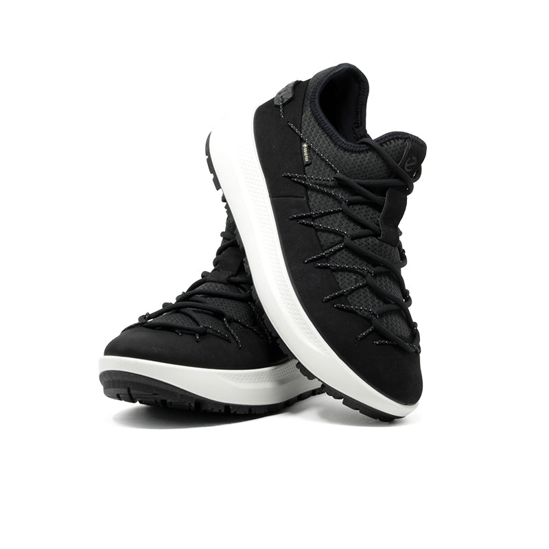 Pair of black lace-up sneakers with padded collar and white outsole