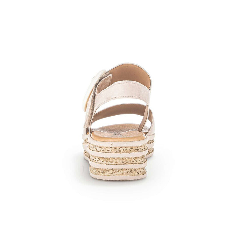 Women’s leather platform sandals in beige, back view with open toe and striped wedge sole