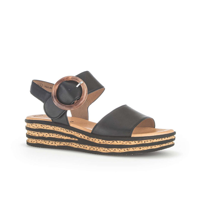 Women’s leather platform sandals in black, round buckle strap and striped stacked wedge sole