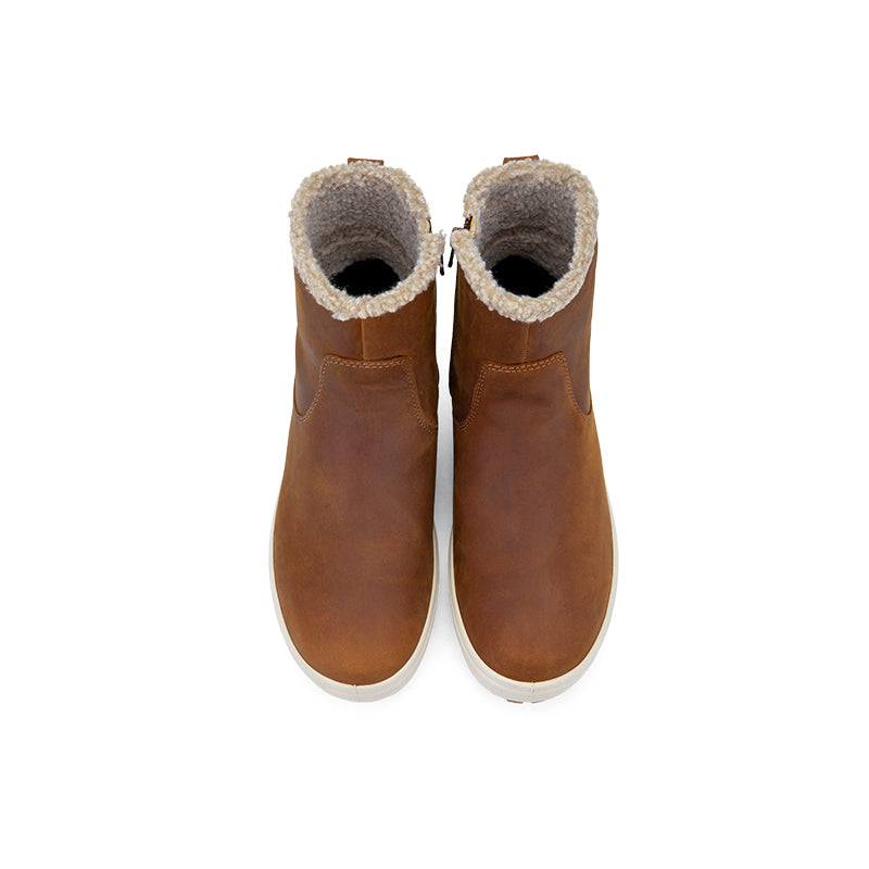 Pair of women's brown suede ankle boots, showing padded openings and white soles.