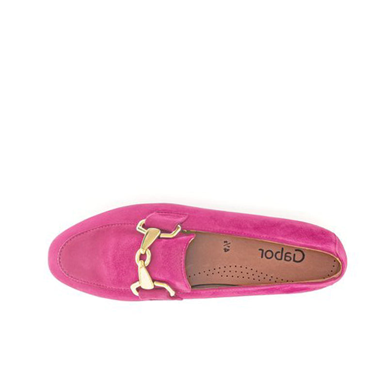Women's bright pink suede loafer with metal buckle strap and perforated insole
