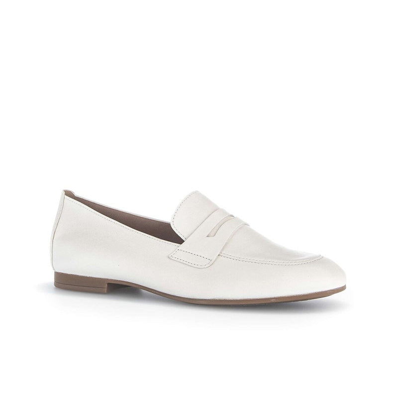 Beige leather loafer with stitched moc-style seams and slip-on strap detail
