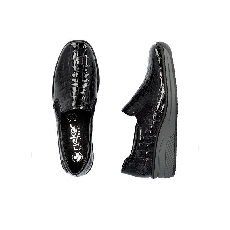Rieker womens loafers pair, black glossy croc-pattern slip-ons with logo on insole
