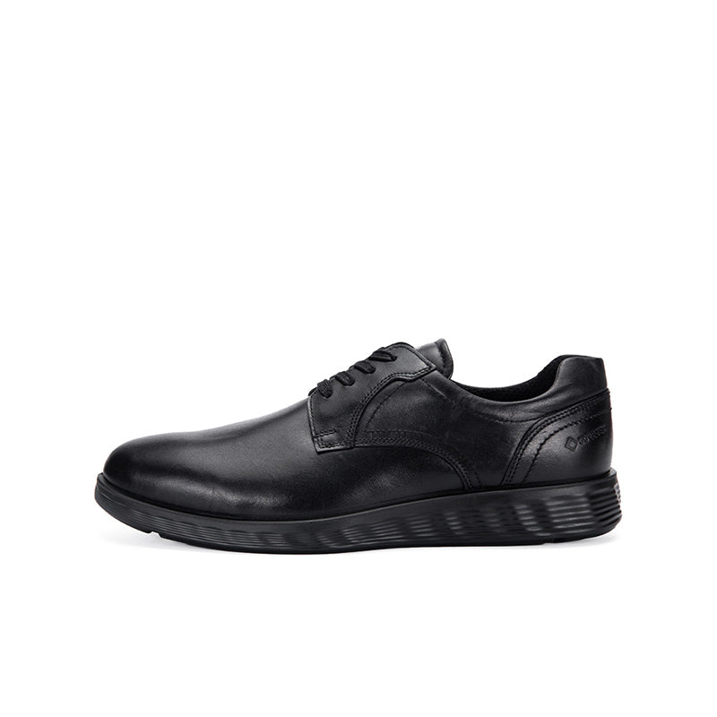 Black leather lace-up derby shoe, side view, textured rubber sole