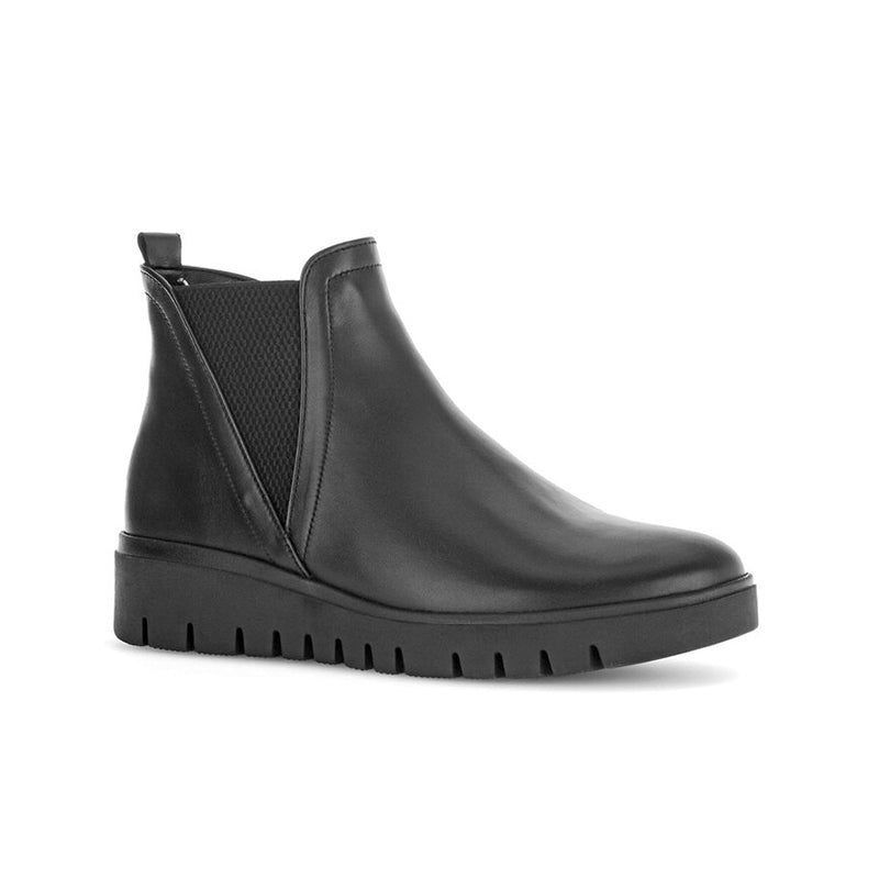 Black leather chelsea boot with elastic side panels and lugged platform sole