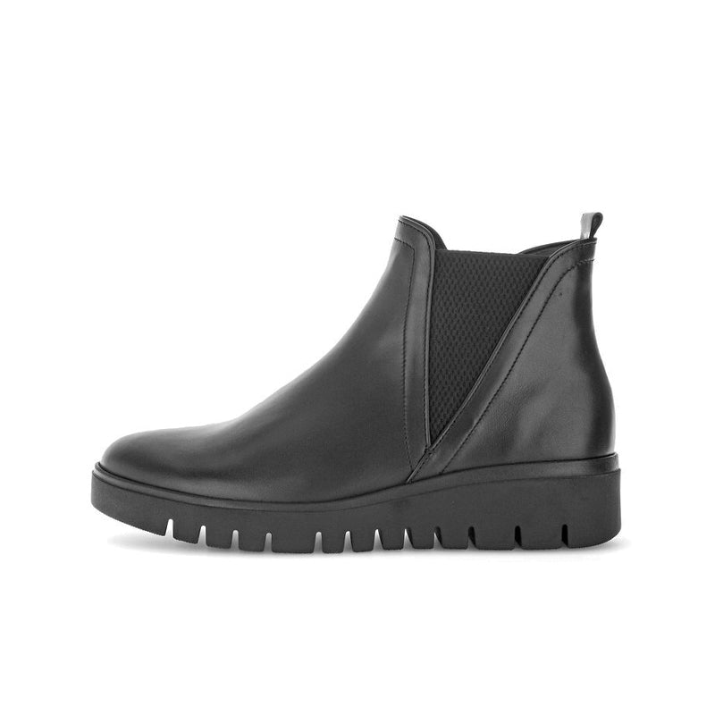 Black leather chelsea boot with elastic inset and rugged platform outsole