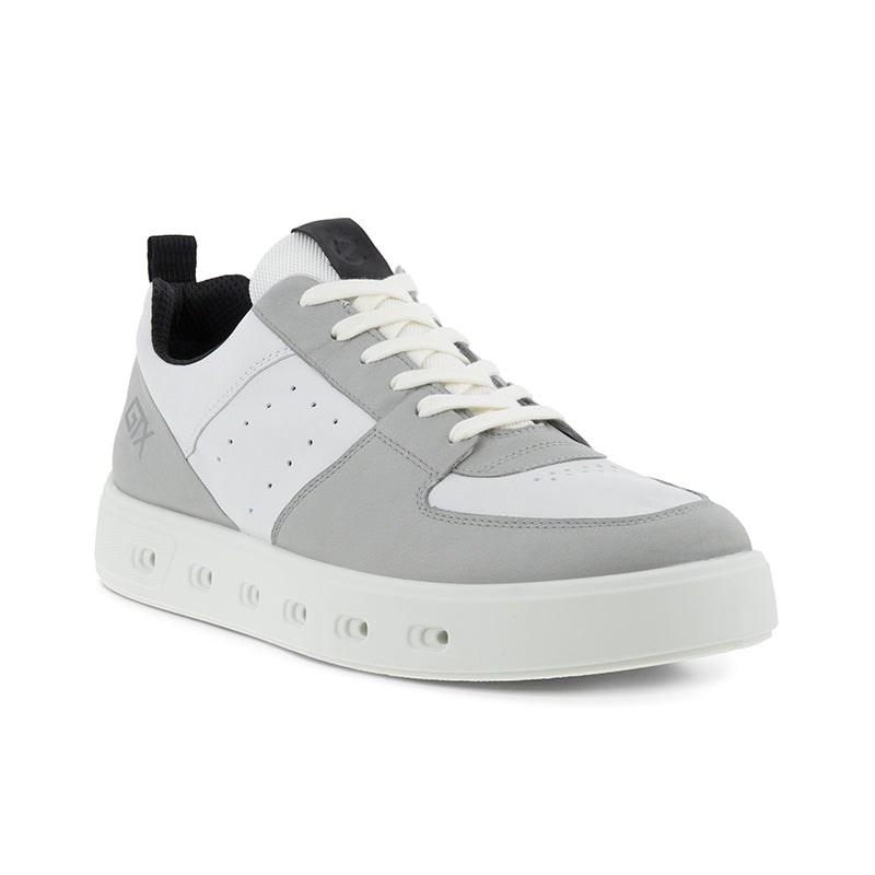 Two-tone mens sneakers with white leather panels, grey accents, lace-up design.