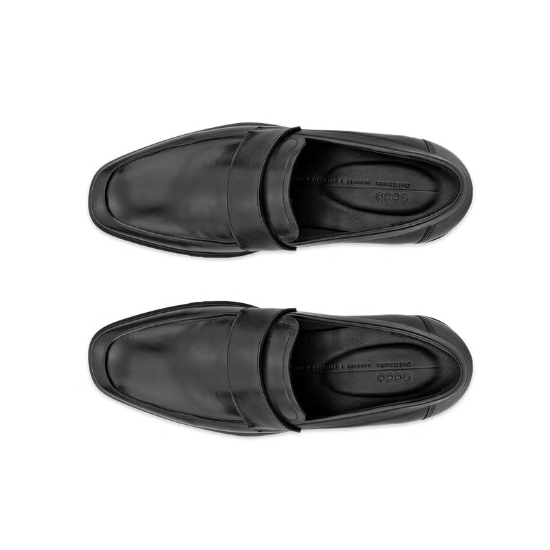Pair of black leather slip-on business shoes, side view with strap