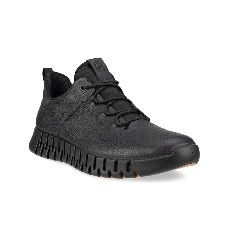 Men's black low-top sneakers with lace-up closure and grippy rubber sole