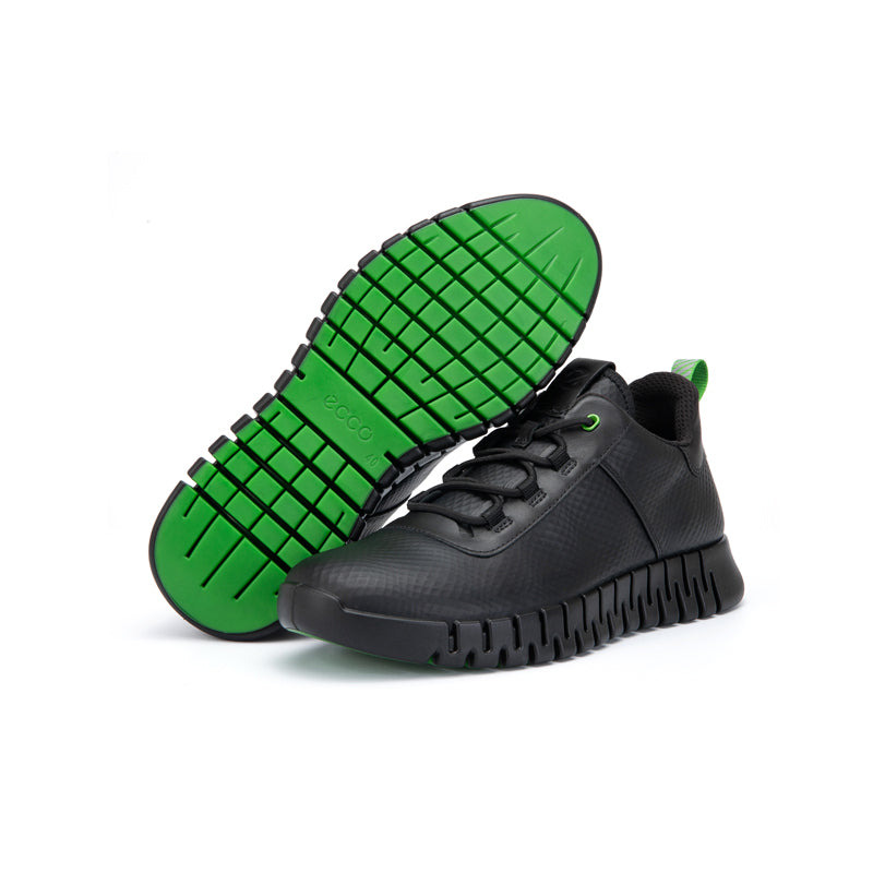 Men's black sneakers with green rubber outsole tread