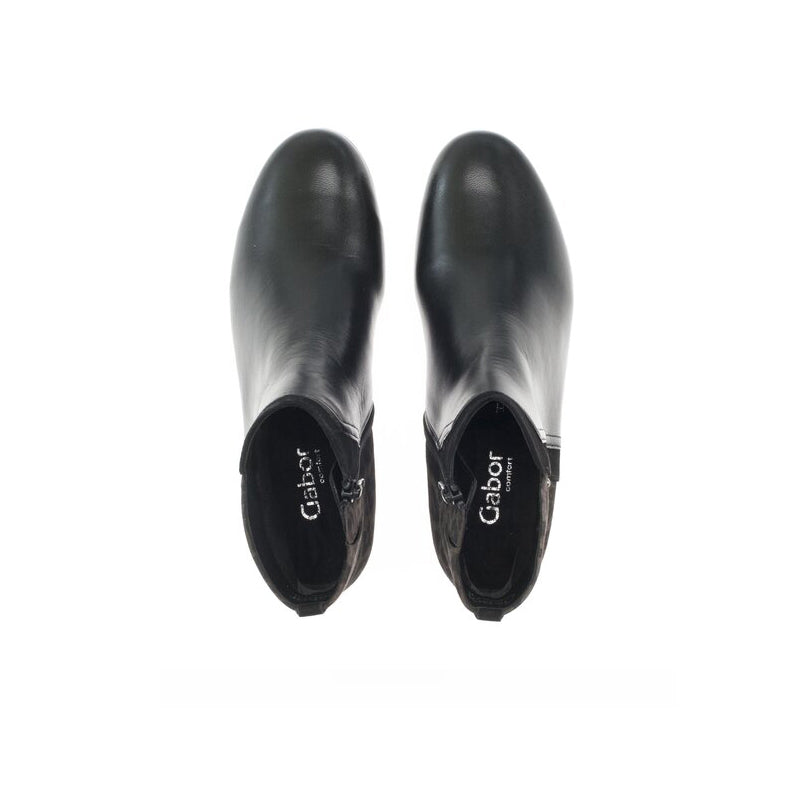 Pair of black leather ankle boots with Gabor branding on heel backs