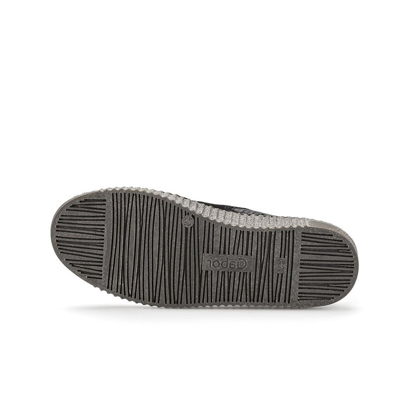 Grey rubber outsole with tread pattern and embossed brand mark