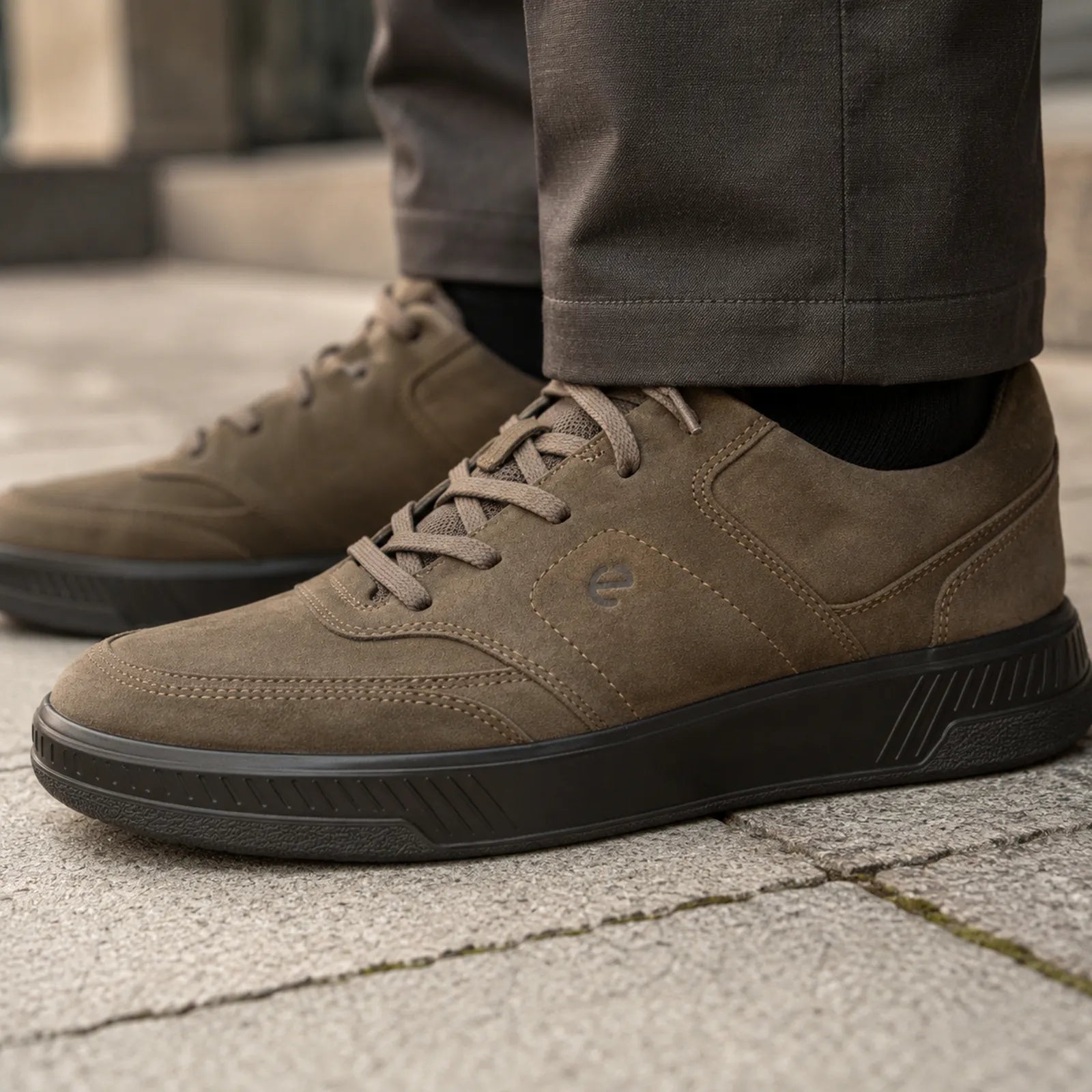 ECCO Move Walker men's dark clay trainers worn with casual outfit for everyday walking and smart casual wear