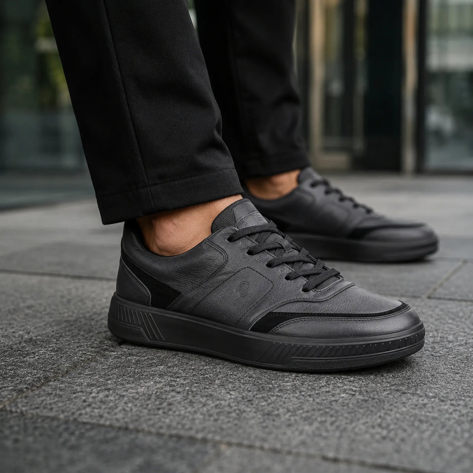 ECCO Move Walker men's black trainers worn with casual outfit for everyday walking and smart casual wear
