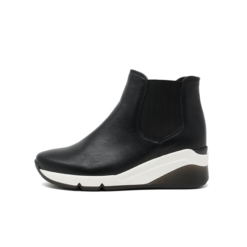 Black leather Chelsea ankle boot with elastic side panels and white sole