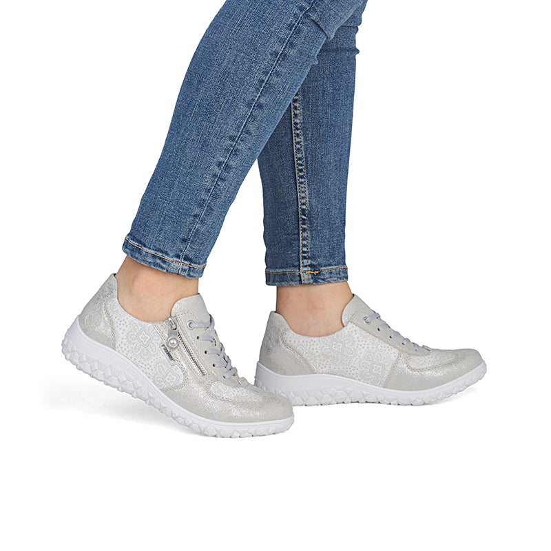 Women's low-top lace-up sneakers in silver with textured upper and cushioned sole