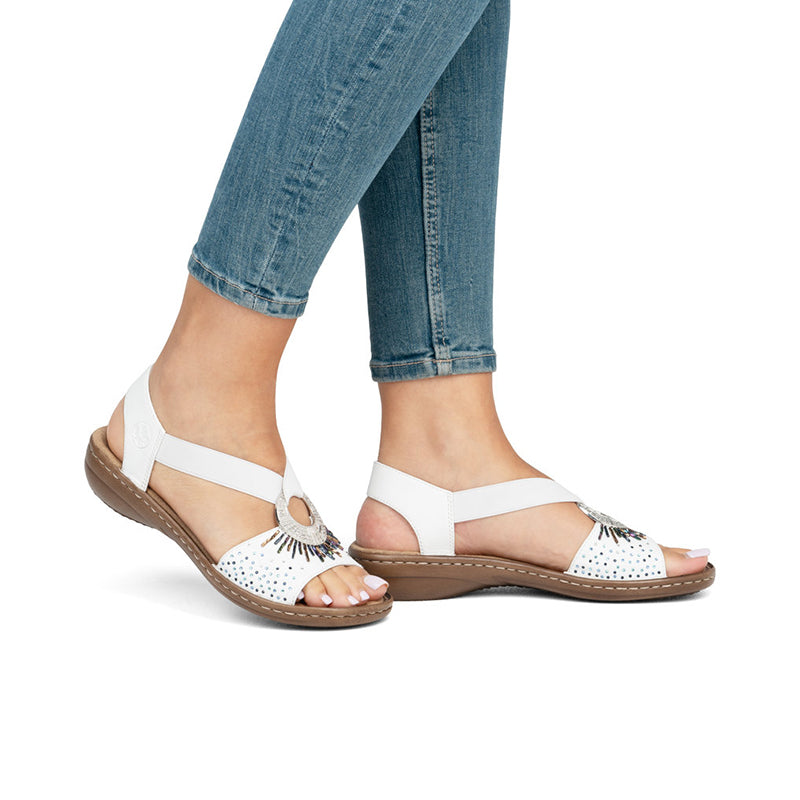 Women’s white open-toe sandals with slingback strap and cushioned sole