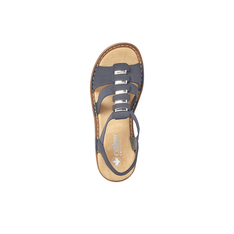 Navy blue open-toe sandals with three metal buckles and cushioned tan footbed