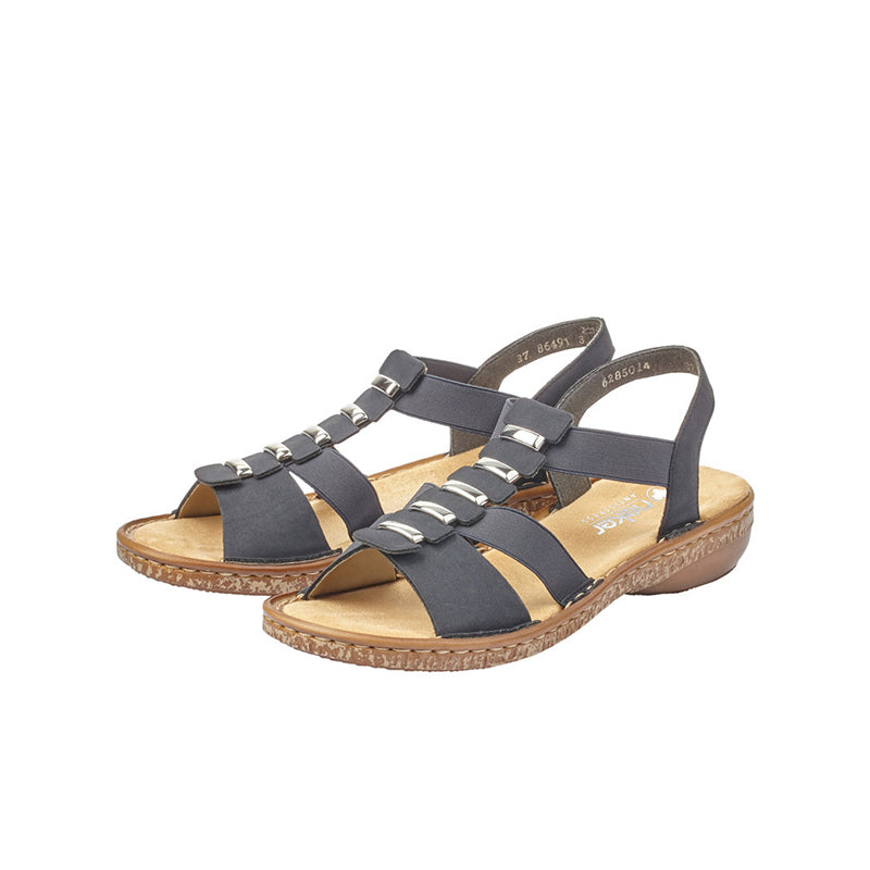 Navy blue open-toe sandals with multiple buckle straps and cushioned tan insole