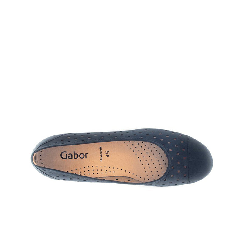 Blue ballet flat with tan insole and perforated upper, rounded toe; brand text visible