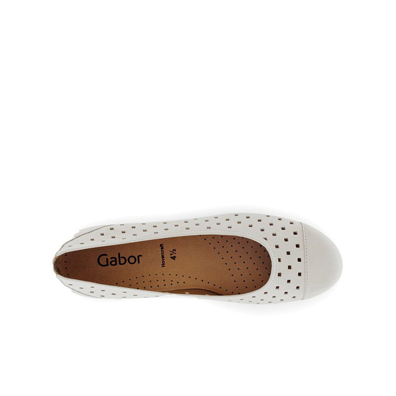 Beige ballet flat with tan footbed and perforated upper, rounded toe; logo visible
