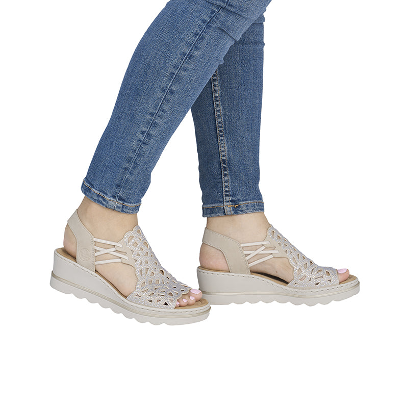 Rieker women's beige sandals with cutout fabric straps and cushioned platform sole