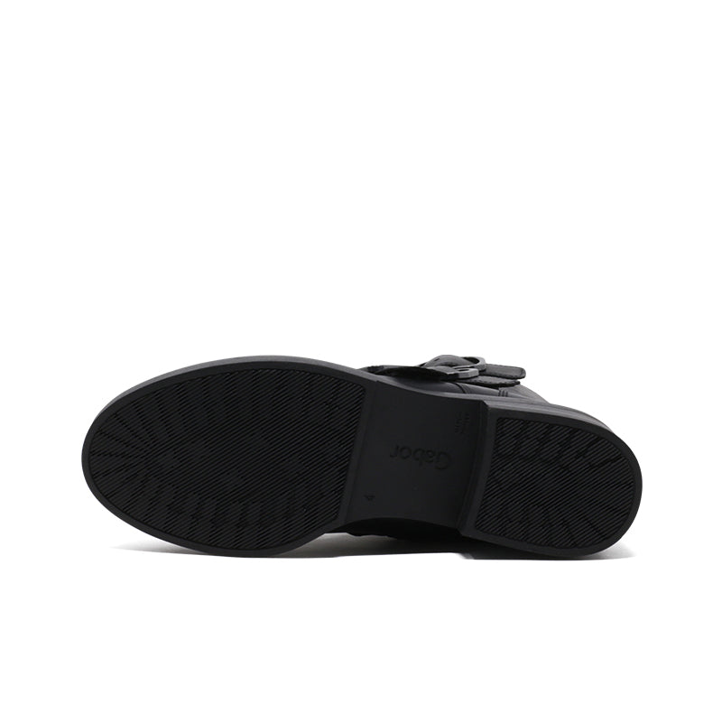 Black boot outsole with textured tread and brand logo