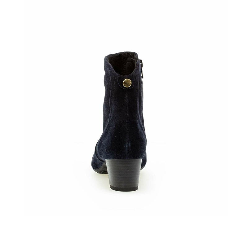 Dark blue suede ankle boot with low block heel and pull-tab