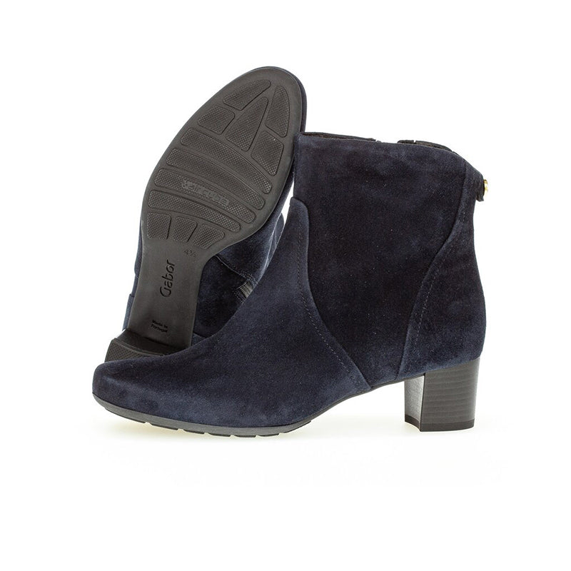 Dark blue suede ankle boot with tread sole and block heel