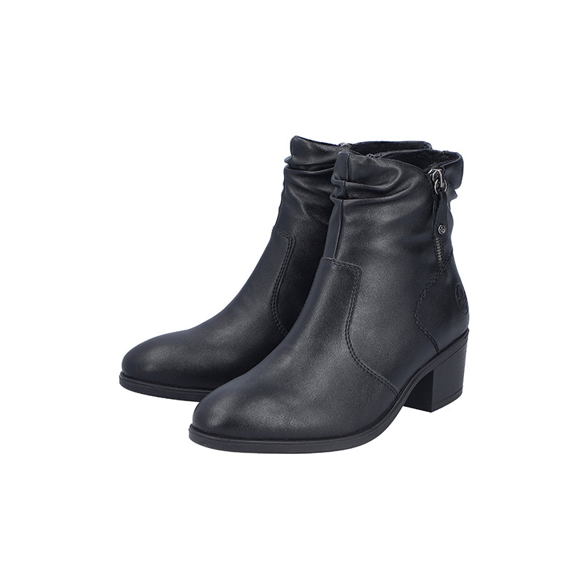 Pair of black leather ankle boots with side zips and block heels